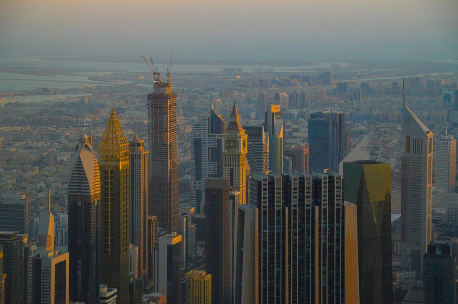Stunning view of Dubai's iconic skyline with modern skyscrapers at sunset.