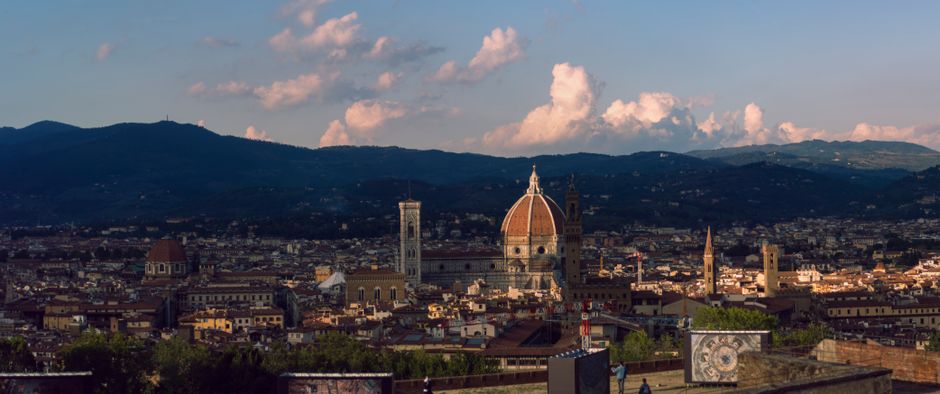 Breathtaking view of Florence at sunset highlighting the Duomo and cityscape.
