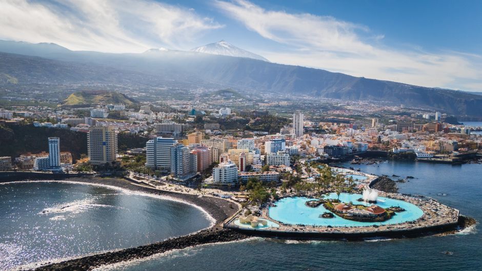 Scenic aerial view of Puerto de la Cruz with Mount Teide in the distance, Tenerife, Canary Islands.